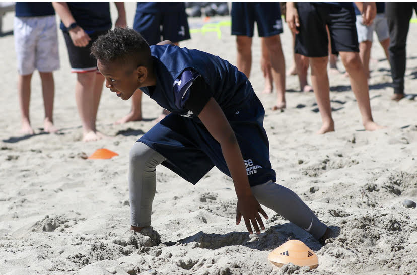 Stampede Elite youth athlete agility drill at Moonlight Beach